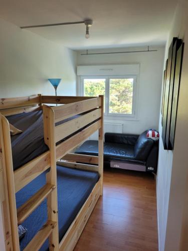 Ένα ή περισσότερα κρεβάτια σε δωμάτιο στο Appartement t3 privatif 56m2 La Baule proche mer