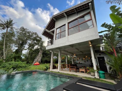 Πισίνα στο ή κοντά στο D'Nanda mini hotel Ubud