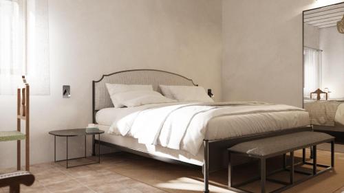 Ένα ή περισσότερα κρεβάτια σε δωμάτιο στο Hotel Boutique Casona de los Rebolledo