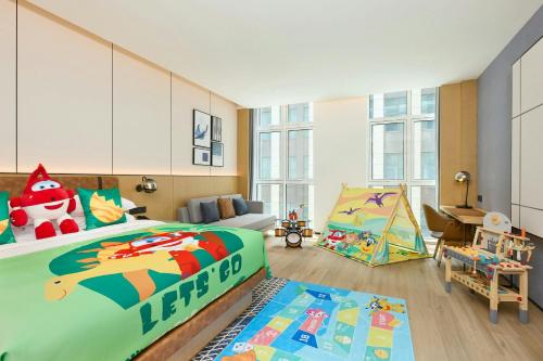Cama o camas de una habitación en Four Points by Sheraton Qingdao, Chengyang East