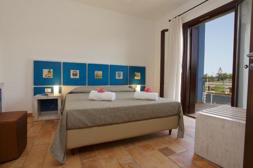 Krevet ili kreveti u jedinici u okviru objekta BfB Residence San Marco