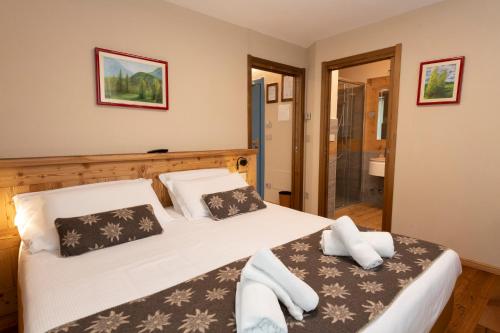 Postel nebo postele na pokoji v ubytování Hotel Granta Parey