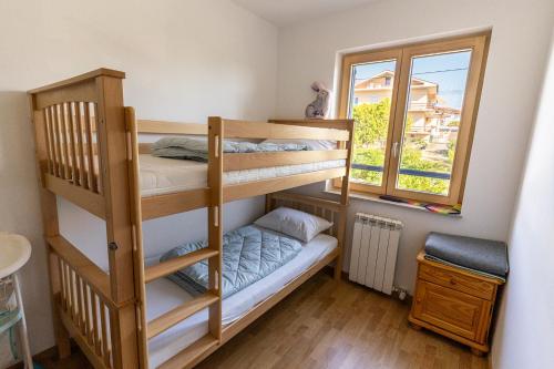 Postel nebo postele na pokoji v ubytování Apartment Stefanija