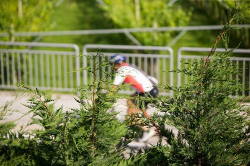 a man is riding a bike on a race track at Agriturismo Vin e Amor in Dro