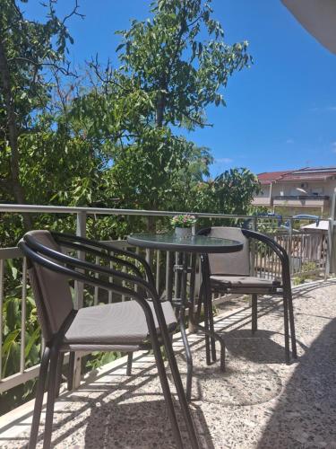 a table and chairs sitting on a patio at Aurora in Potos