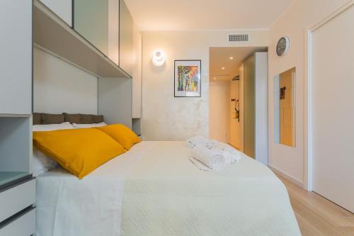 Ένα ή περισσότερα κρεβάτια σε δωμάτιο στο Private Parking - Athena Suite nel cuore di Bari