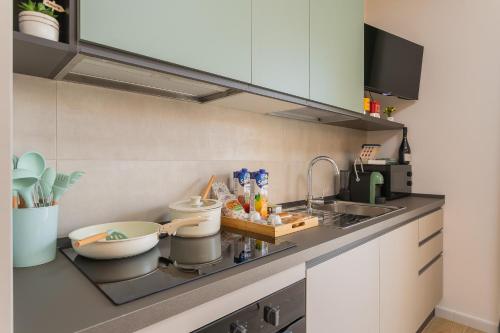 Η κουζίνα ή μικρή κουζίνα στο Private Parking - Athena Suite nel cuore di Bari