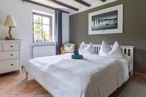 Postel nebo postele na pokoji v ubytování Ferienwohnung "Ostseewind"