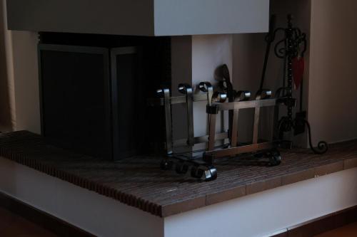 a counter top with a bunch of tools on it at Cannubi San Lorenzo Appartamento in Barolo