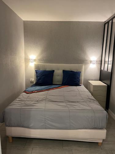 Ένα ή περισσότερα κρεβάτια σε δωμάτιο στο Cozy 2 pièces, 41 m2 in Boulogne Billancourt