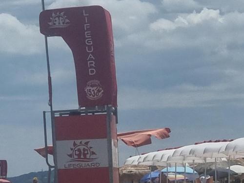 Et logo, certifikat, skilt eller en pris der bliver vist frem på Cori I