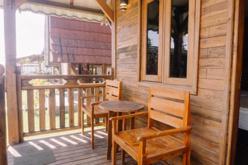 Балкон или терраса в Beranda Villa