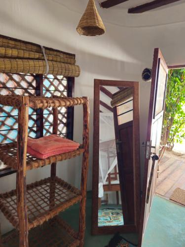 Postel nebo postele na pokoji v ubytování Evergreen Bungalows