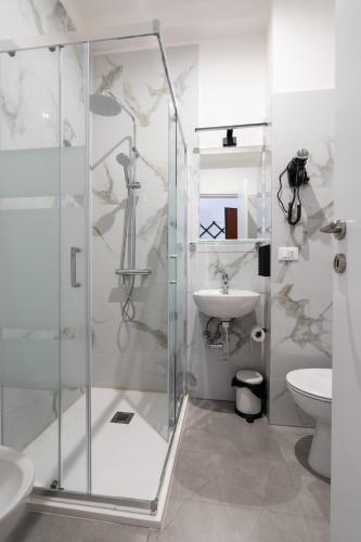 a bathroom with a shower and a sink at Elegant Apartments Rapallo in Rapallo