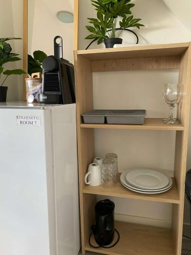 Η κουζίνα ή μικρή κουζίνα στο Cozy Private Room Central Location
