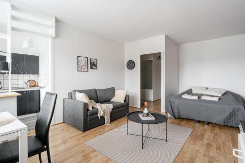 Posezení v ubytování Comfy Studio Apt in Prime Downtown Location