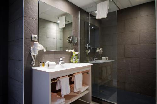 Koupelna v ubytování Hotel Salomé