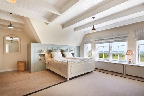 Postel nebo postele na pokoji v ubytování Reethaus am Strand - Ost