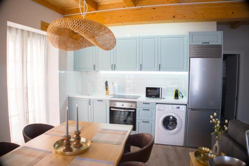 Η κουζίνα ή μικρή κουζίνα στο VIA DE LA PLATA SUITES 1a