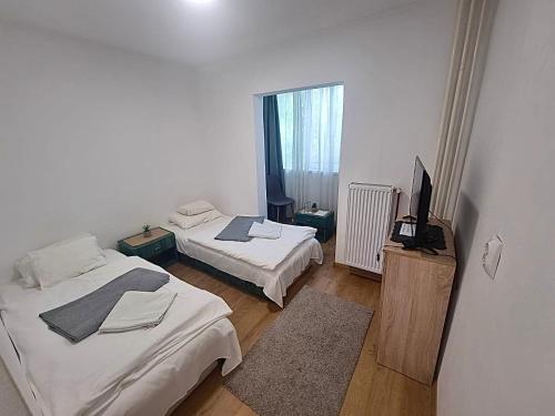 Postel nebo postele na pokoji v ubytování Szent Ferenc Vendégház