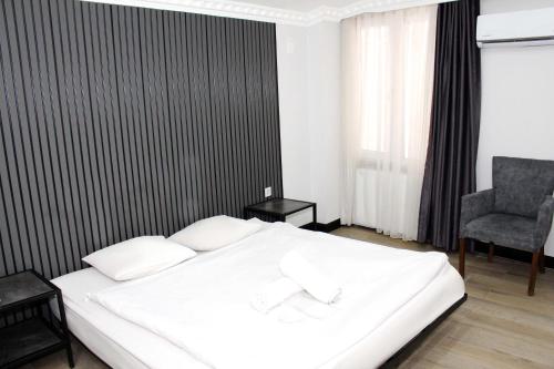 Una cama o camas en una habitación de Avist Hotel Avcılar