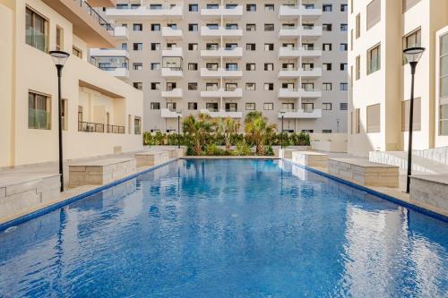 Bazén v ubytování Studio Élégant avec piscine à Zenata Eco city nebo v jeho okolí
