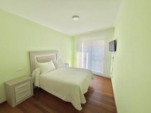 Postel nebo postele na pokoji v ubytování Apartamento Bellavista