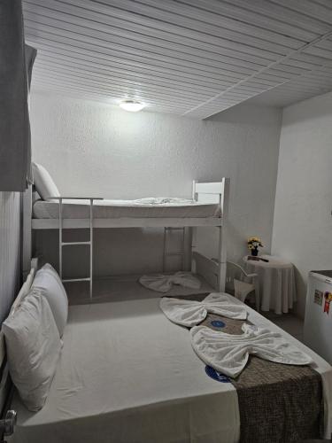 Postel nebo postele na pokoji v ubytování Hospedagem São Francisco