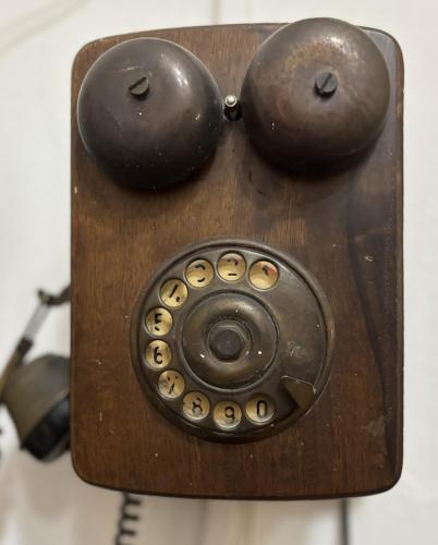 a wooden phone with two dials on it at B&B La Fontanina in Siena