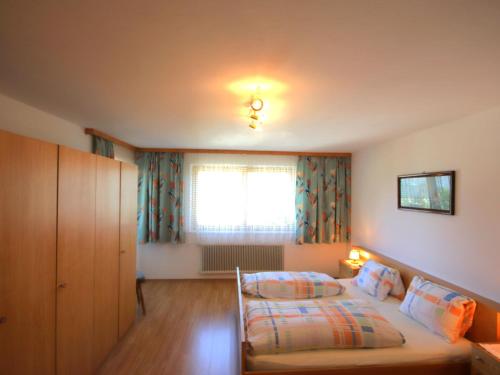 Katil atau katil-katil dalam bilik di Apartment Jägerhof-1 by Interhome