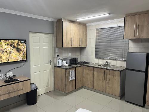 Dapur atau dapur kecil di Mashobs Guest House