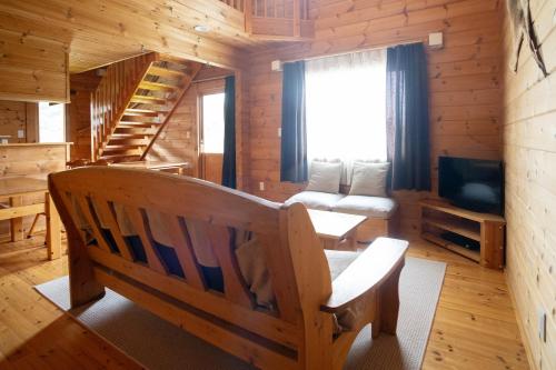 TV a/nebo společenská místnost v ubytování パウダー小屋