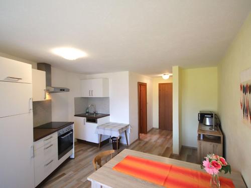 A kitchen or kitchenette at Apartment Jägerhof-3 by Interhome