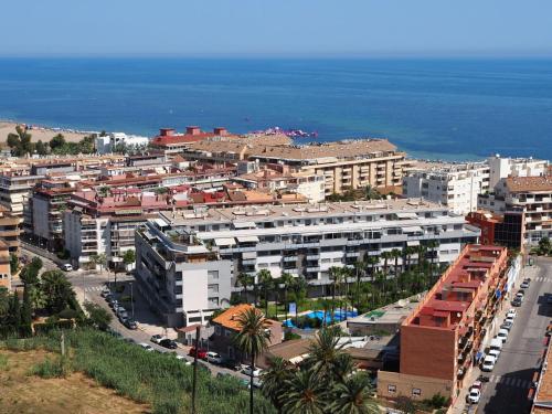 an aerial view of a city with buildings and the ocean at Apartment Marina Raset by Interhome in Denia