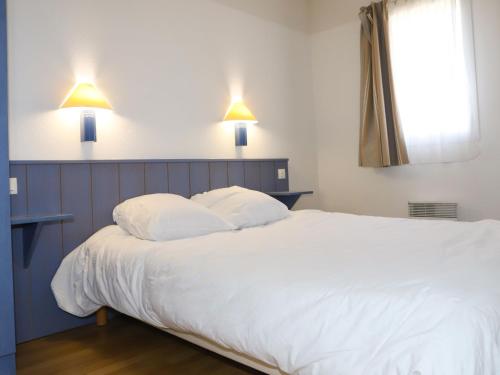 Postelja oz. postelje v sobi nastanitve Apartment Les Sables Vignier-1 by Interhome