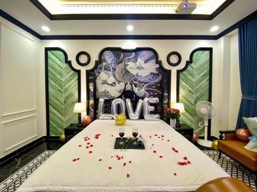Ένα ή περισσότερα κρεβάτια σε δωμάτιο στο Luxury Place Hotel