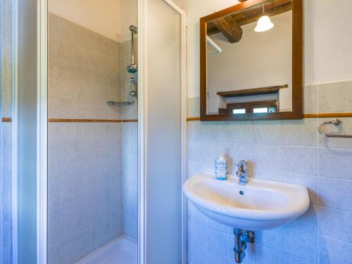 a bathroom with a sink and a shower at Holiday Home Olivo by Interhome in Lucolena in Chianti