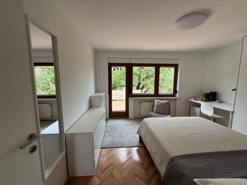 Postel nebo postele na pokoji v ubytování ANMARI Apartment & Rooms