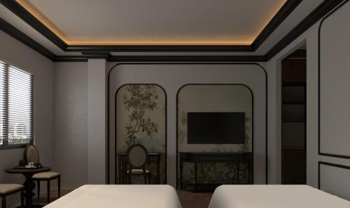 Ένα ή περισσότερα κρεβάτια σε δωμάτιο στο Luxury Place Hotel