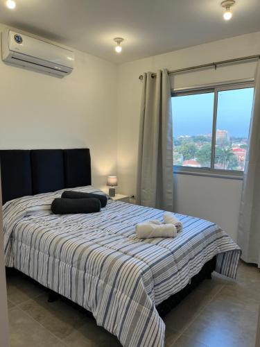 Una cama o camas en una habitación de TR Recoleta