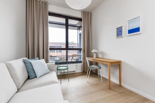 Χώρος καθιστικού στο Młode Miasto Doki Apartments by HappyStay