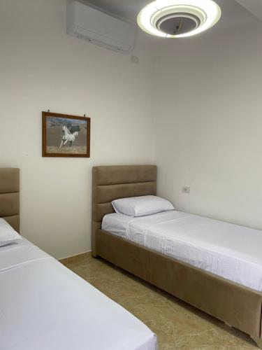 Postel nebo postele na pokoji v ubytování Guest house Irvin