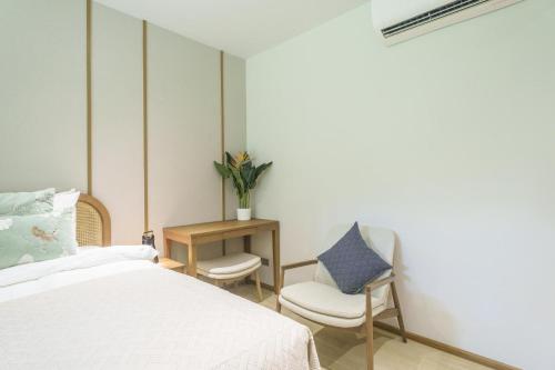 Postel nebo postele na pokoji v ubytování Laguna Beachfront 3BR Cozy Condo