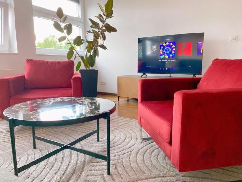 Μια τηλεόραση ή/και κέντρο ψυχαγωγίας στο TheArtApart Hannover-Design-Messe-Parken-Fitness