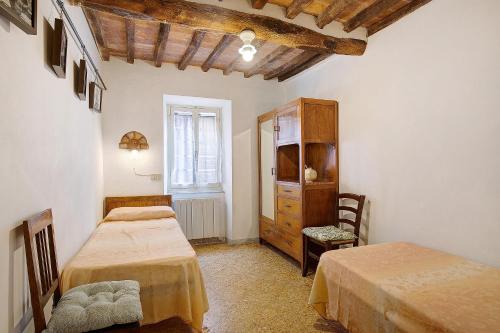 Katil atau katil-katil dalam bilik di Palazzo Ferretti - Pietrasanta