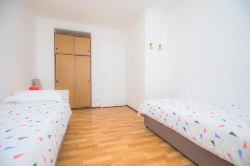 Letto o letti in una camera di Feel the sea