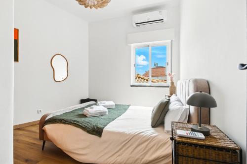 Ένα ή περισσότερα κρεβάτια σε δωμάτιο στο Sea Side