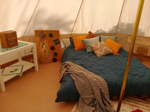 a bedroom with a bed in a tent at Sve Mir in Boljevac