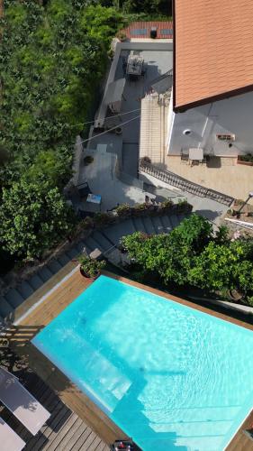 an overhead view of a swimming pool on a building at Villa Walter in Sorrento
