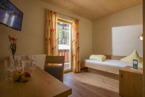 Ein Bett oder Betten in einem Zimmer der Unterkunft Seehotel St Hubertus
